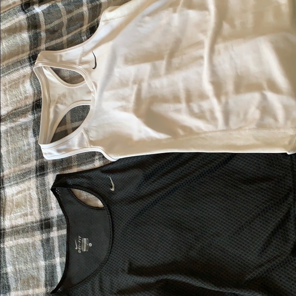 White and black nike dry fit tanks size M